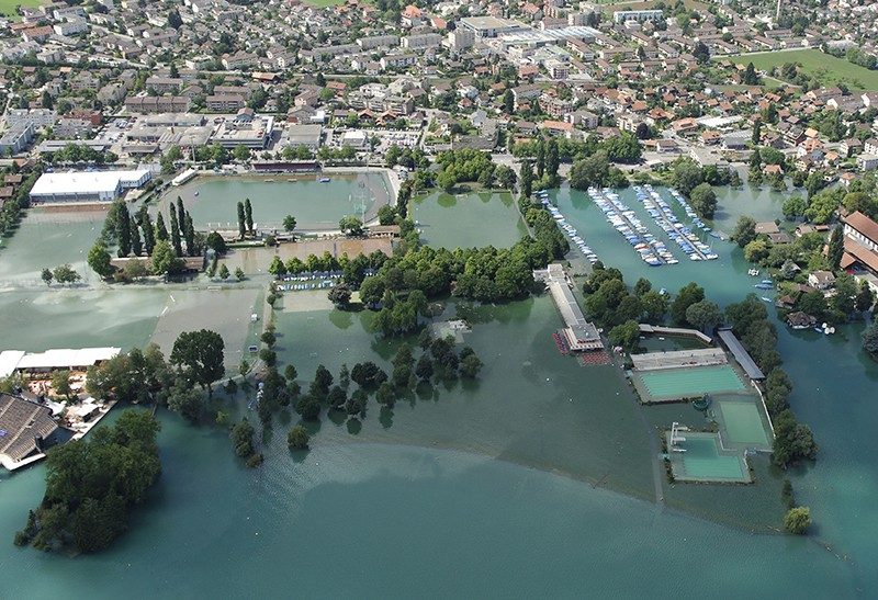 Picture shows flooded residential area.